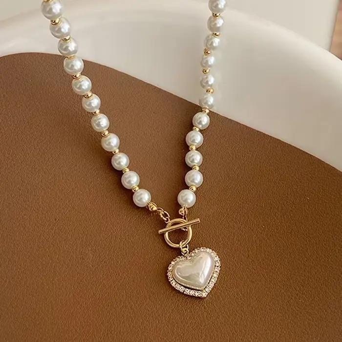 Collier élégant en perles d'imitation pour femmes, chaîne de luxe en perles d'imitation, chaîne de c
