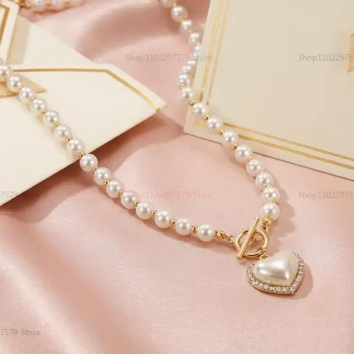 Collier élégant en perles d'imitation pour femmes, chaîne de luxe en perles d'imitation, chaîne de clavicule, bijoux à breloques