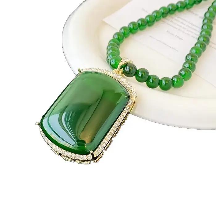Nouveau collier long en saphir vert de style chinois, chaîne de pull de luxe, bijou pendentif automne-hiver, élégance et sensation haut de gamme