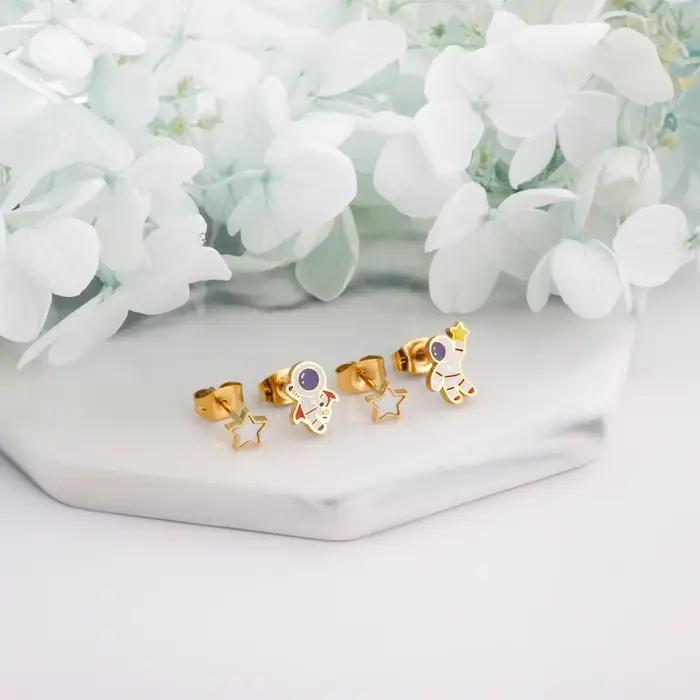 LUXUSTEEL 2 Paires Nouvelles Boucles d'Oreilles Clous Petites Forme Astronaute Étoile Bijoux Tendance Brinco Pendientes Mujer Couleur Dorée Pour Fête