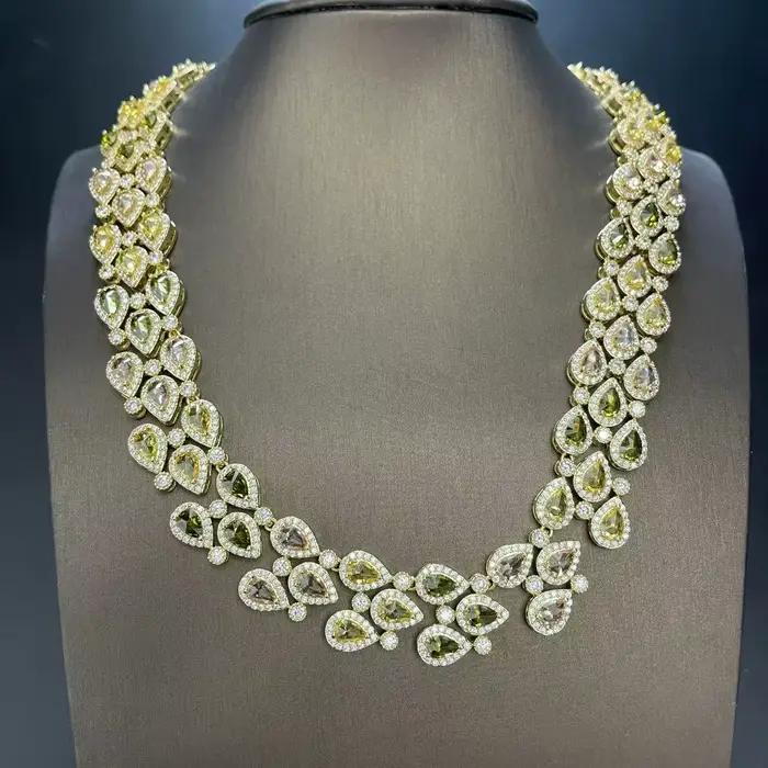 Ensemble collier, bracelet et boucles d'oreilles en forme de goutte d'eau pour femme, entièrement serti de zircon