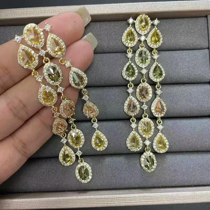 Ensemble collier, bracelet et boucles d'oreilles en forme de goutte d'eau pour femme, entièrement serti de zircon