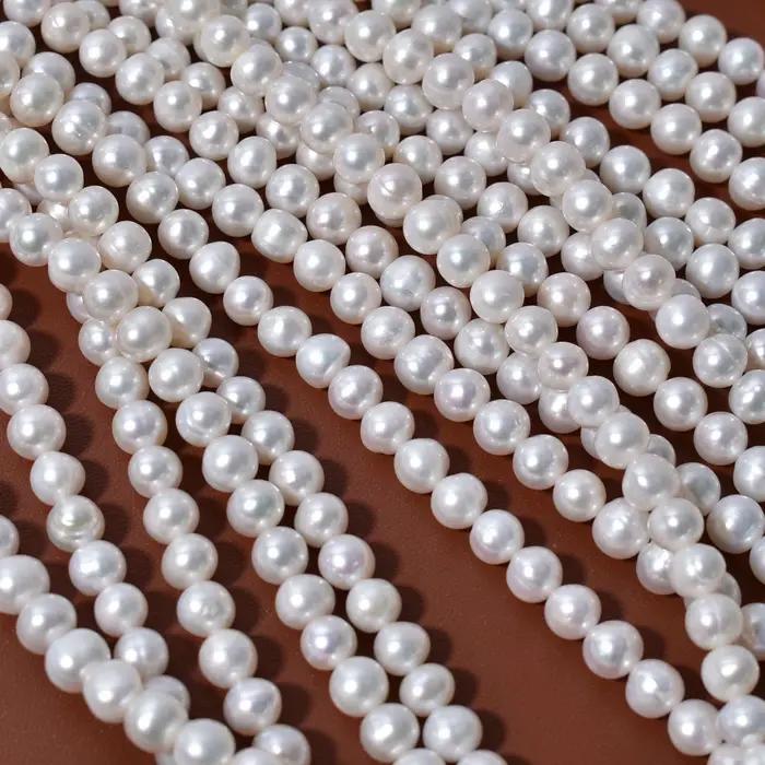 Perles d'eau douce naturelles filetées