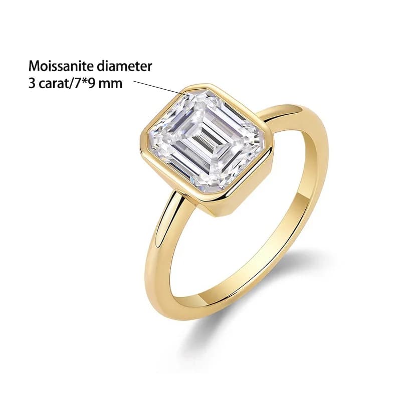 Une bague de haute qualité et polyvalente, ornée d'un moissanite taille émeraude de 3 carats en arge